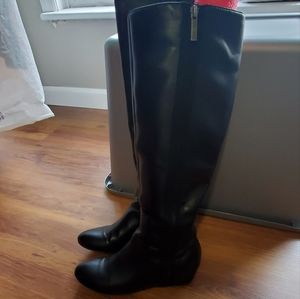 Black tall, zip-up boots